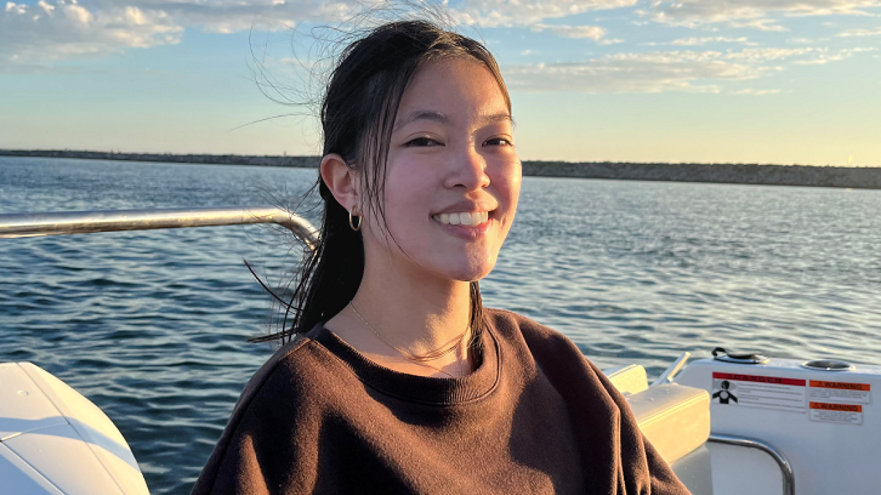Tiffany Chan sitting in a boat