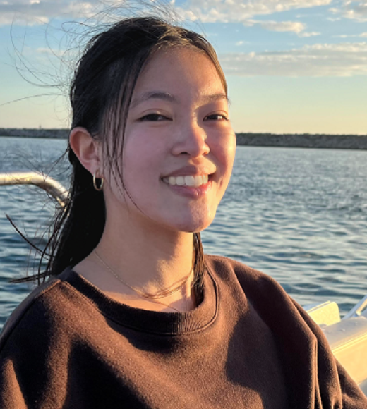 Tiffany Chan sitting in a boat